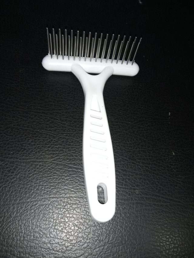 White Handle Comb